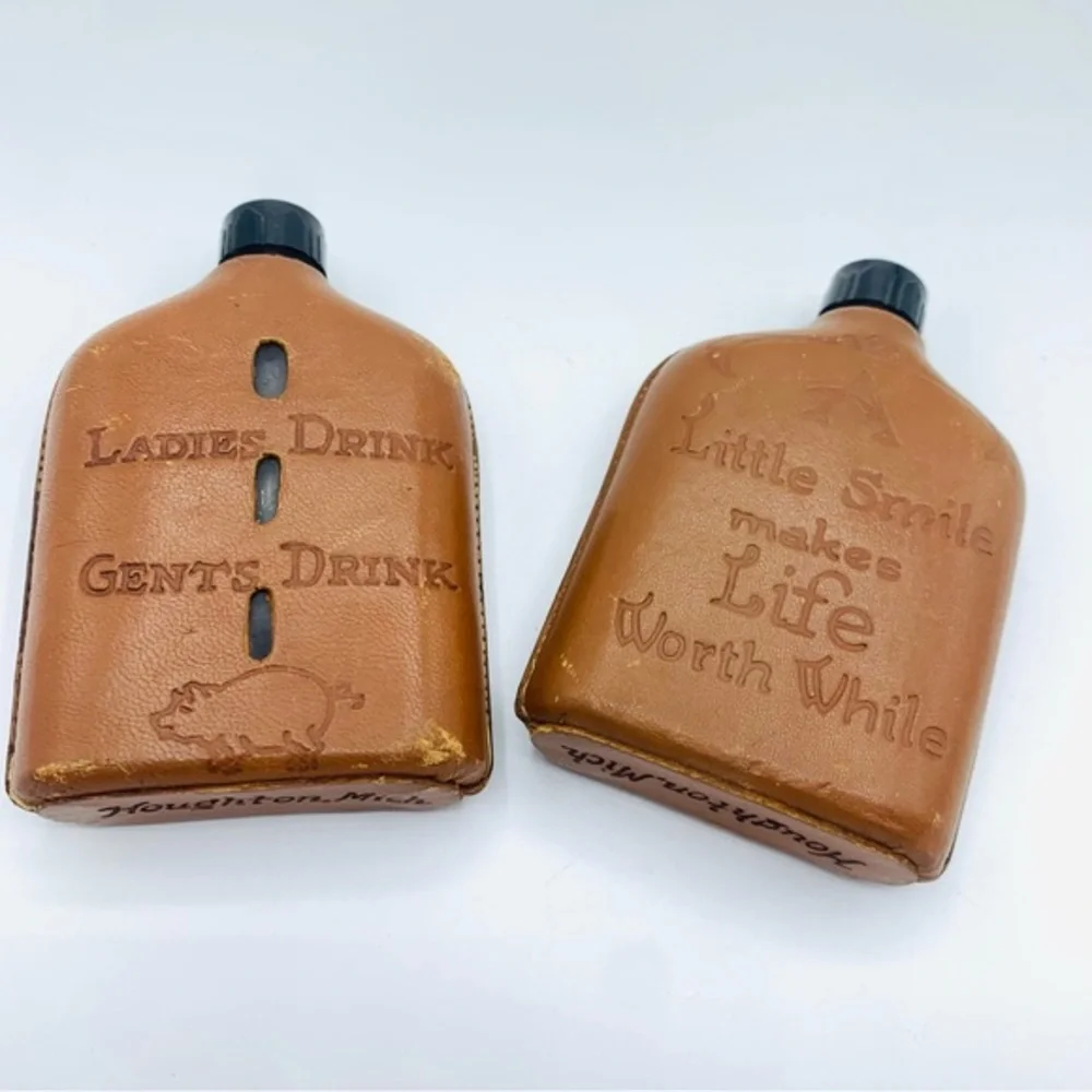 Pair Of Vintage Souvenir Leather Wrapped Glass Whiskey Flasks